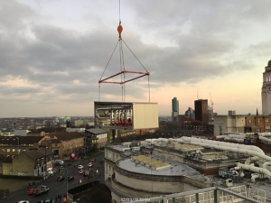 Update from BAM Construction of the plant room being craned to the roof of the Sir William Henry Bragg Building