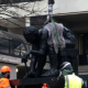 Master of the Universe sculpture outside Edward Boyle library being put into place by constructors.