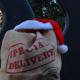 Christmas sack with gifts outside the Beech Grove Plaza Christmas tree