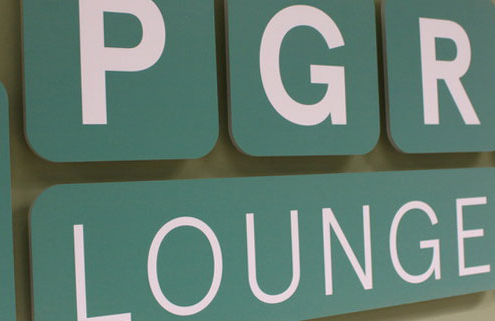 PGR room sign reads PGR Lounge