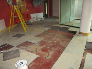 Flooring tiles removed in construction works