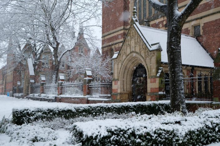 the great hall and garden covered in snow