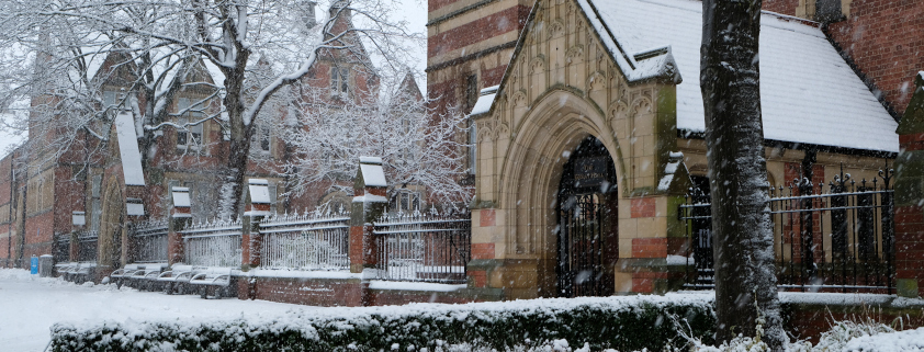 the great hall and garden covered in snow