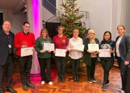 Head of cleaning with award winners at cleaning awards ceremony