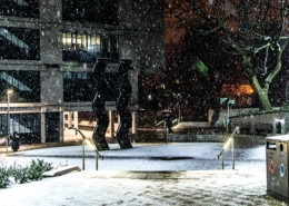Sign for Art statue in winter time